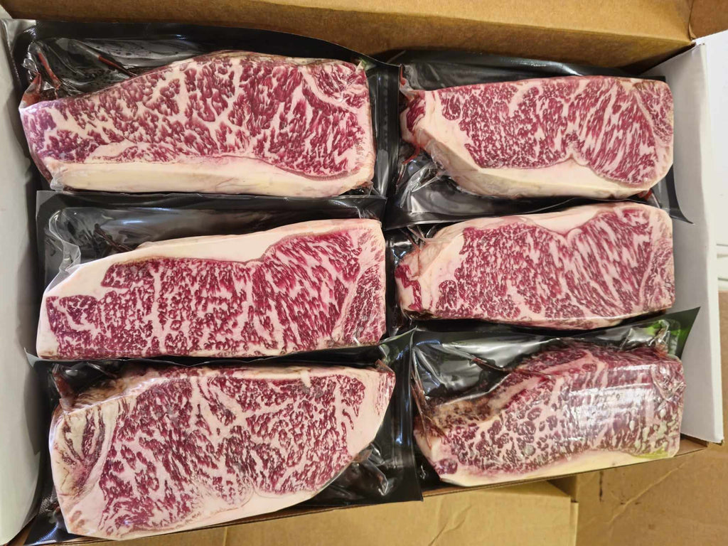 Australian Wagyu New York Strips - (8) 20 oz Steaks - Free Shipping - 8-10 bms