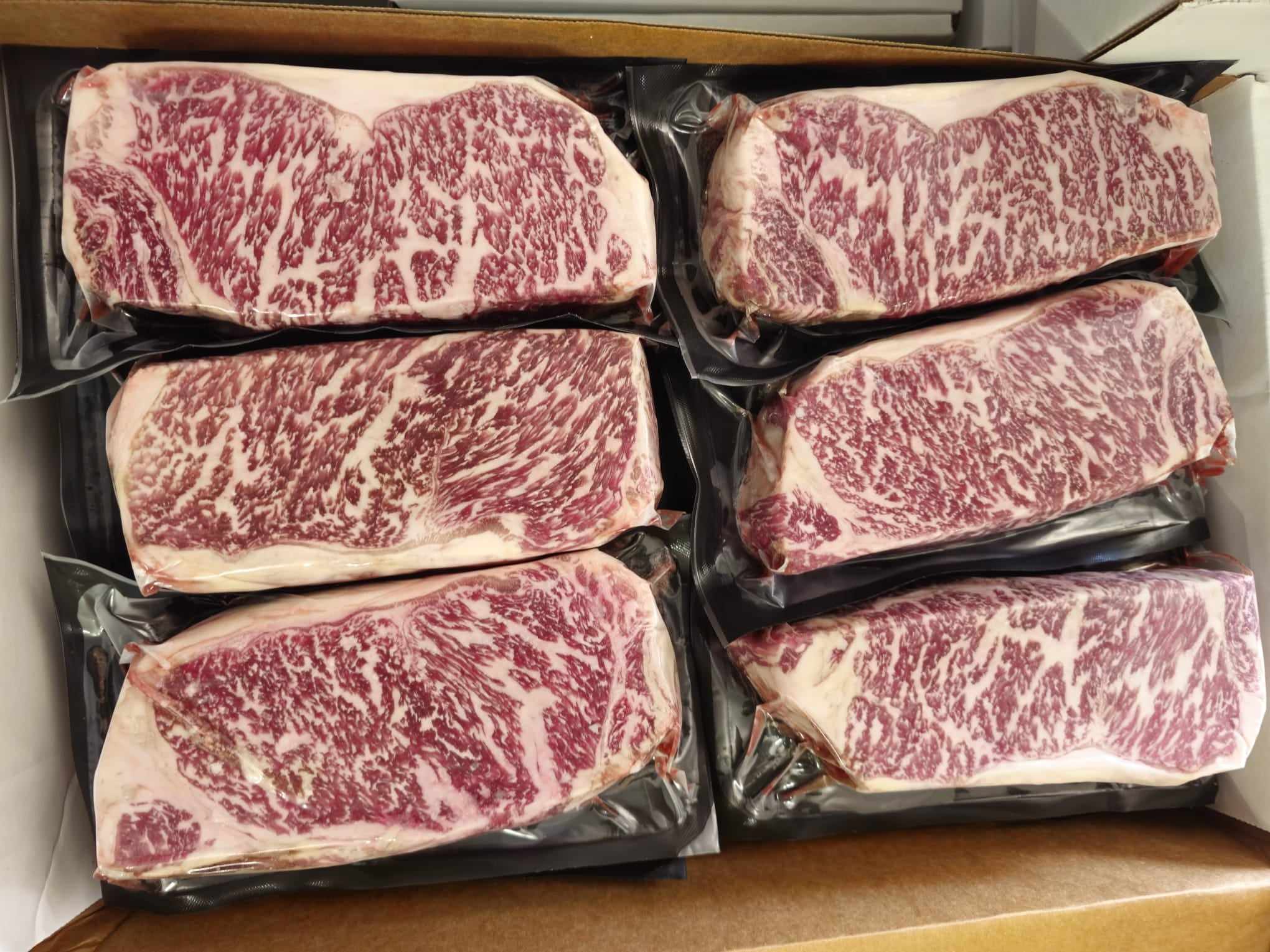 Australian Wagyu New York Strips - (8) 20 oz Steaks - Free Shipping - 8-10 bms